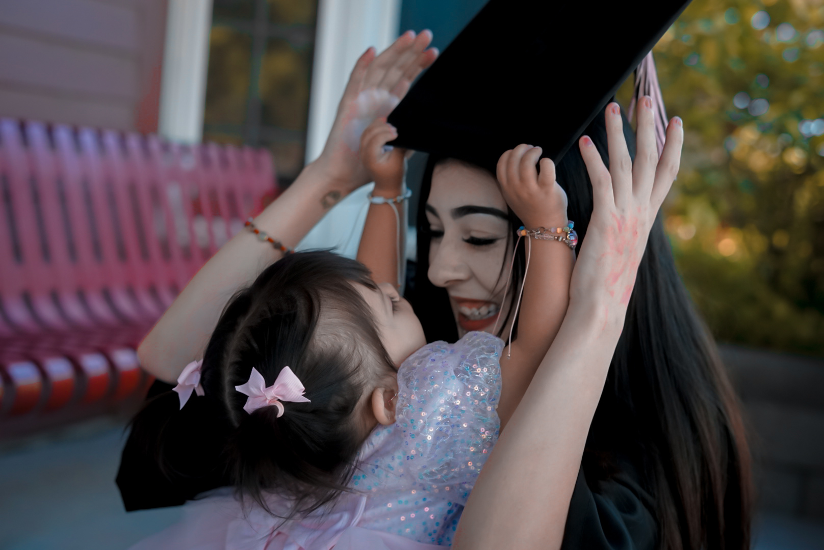 Graduation moment with a child from The Nocturne session